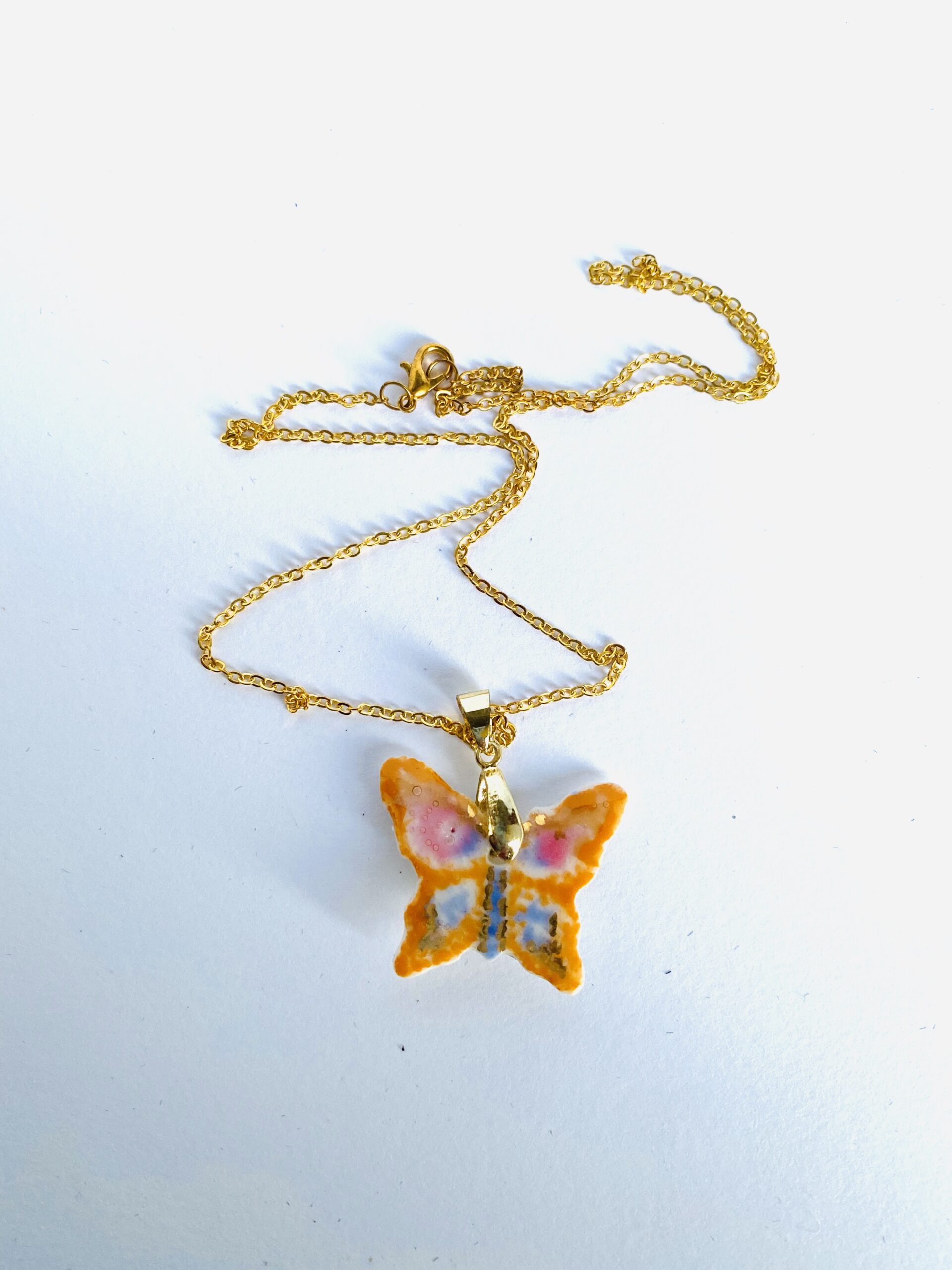 Bijou papillon en porcelaine